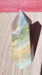 Natural polished Caribbean Blue Calcite point